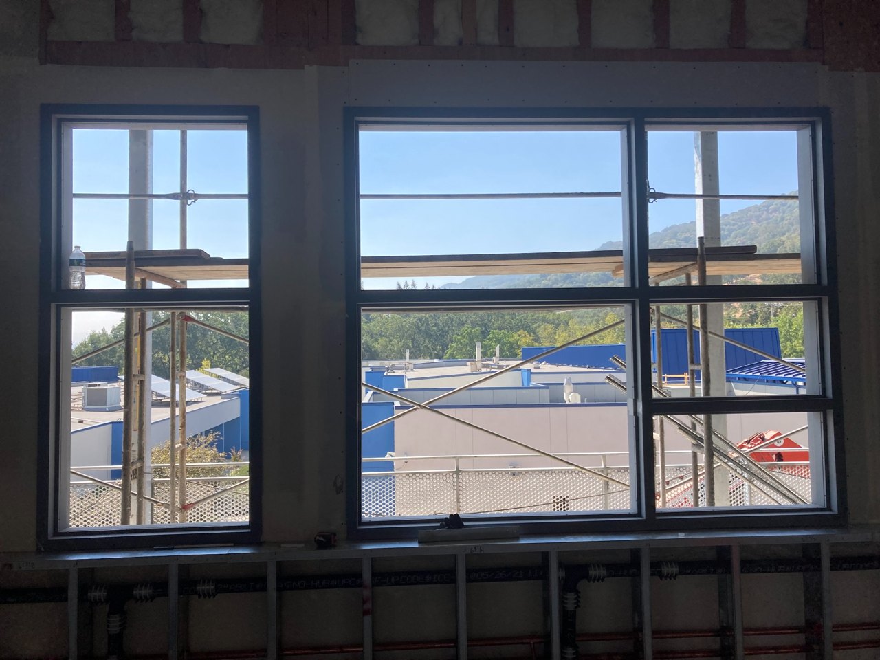 Commercial windows viewed from inside during installation